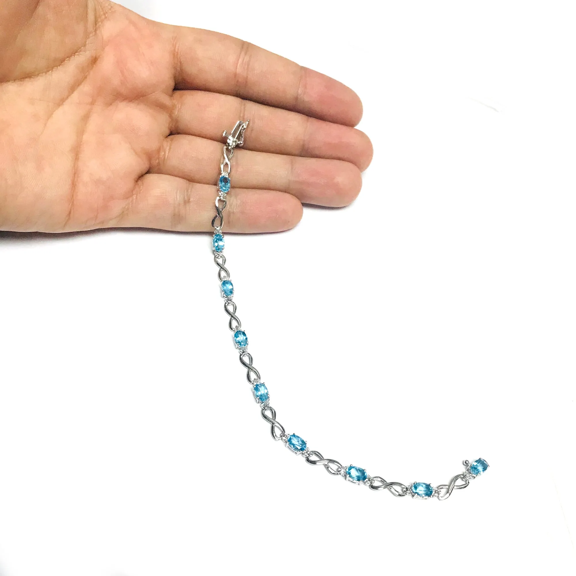 10K White Gold Oval Blue Topaz Stones And Diamonds Infinity Tennis Bracelet, 7"