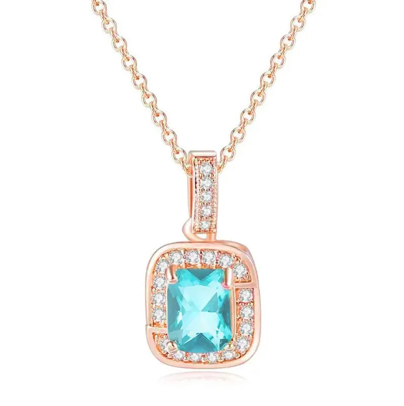 18K Rose Gold Created Blue Topaz Princess Halo Pendant Necklace, Earrings and Tennis Bracelet Jewelry Set Plated