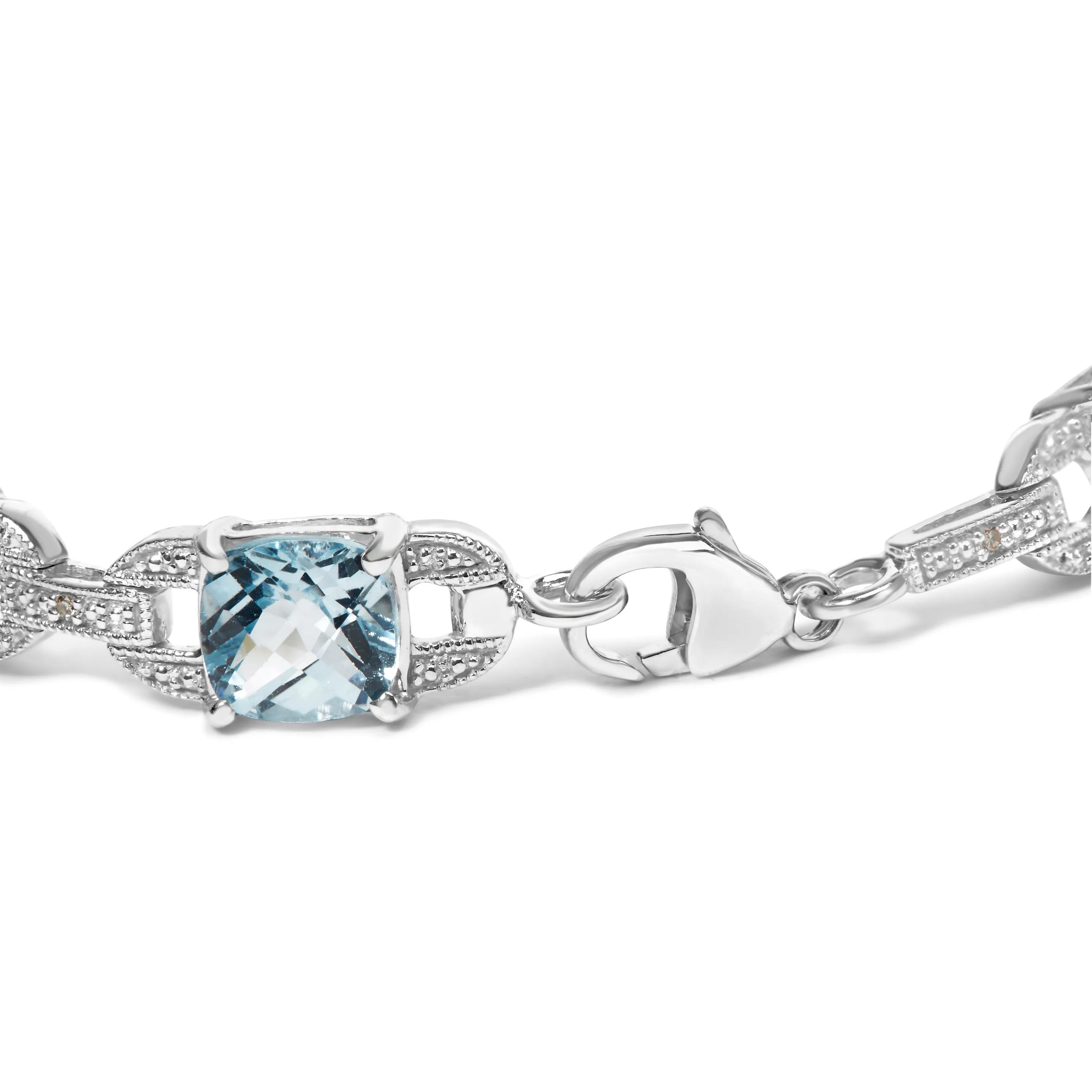 .925 Sterling Silver 7x7 mm Cushion Cut Blue Topaz and 1/20 cttw Round Cut Diamond Fashion Tennis Bracelet