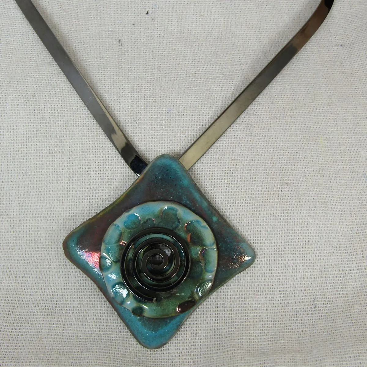 Gunmetal Choker with Handmade Aqua Wash Raku Glazed Pendant