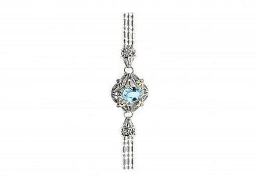 Italian sterling silver bracelet with blue topaz center stone, 0.15ct white diamonds and solid 14K yellow gold accents