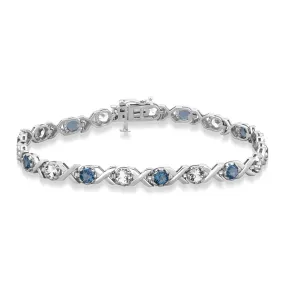 Jewelili Sterling Silver With Round Swiss Blue Topaz and Created Round White Sapphire Tennis Bracelet