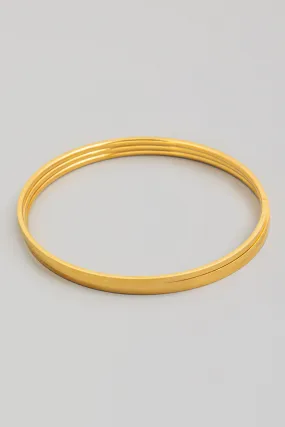 Three Separate Thin Bangles in Gold