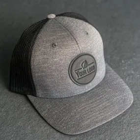 Your Logo on a Leather Patch Performance Style Trucker Hat - Circle Patch